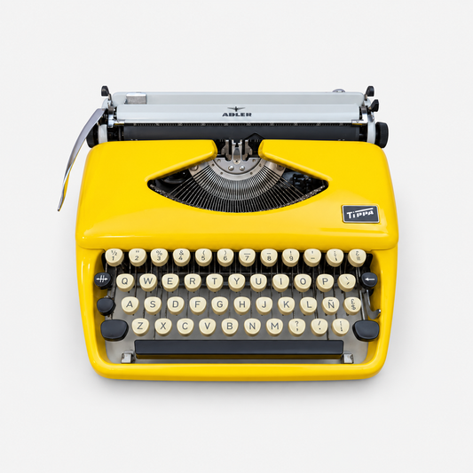 Adler Tippa Yellow Vintage Manual Typewriter, Spanish QWERTY, Cursive Typeface, Serviced