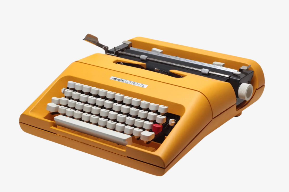 Máquina de escribir manual restaurada Olivetti Lettera 35 Amarilla Vintage - ElGranero Typewriter.Company