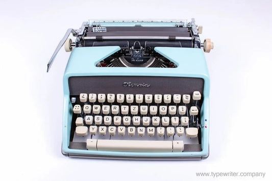 SOLD! Olympia SM7 / Monica Blue, Vintage Manual Typewriter, Restored - ElGranero Typewriter.Company