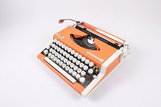 Olympia Traveller Orange Typewriter, Vintage Manual, Refurbished - ElGranero Typewriter.Company