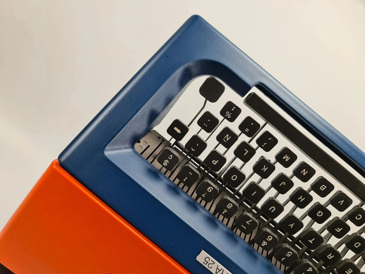 SOLD! Olivetti Lettera 25 Navy Blue / Orange, Vintage Manual Typewriter, Restored - ElGranero Typewriter.Company